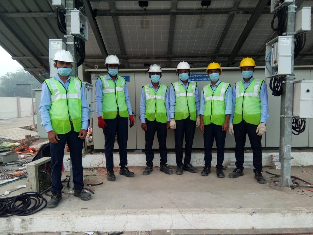 Prayosha Solar engineering team at an installation site